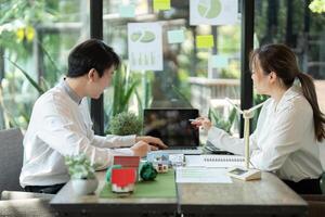 Data-Driven Strategies and Team Dynamics. Analyzing sustainable project plans in a collaborative workspace. photo