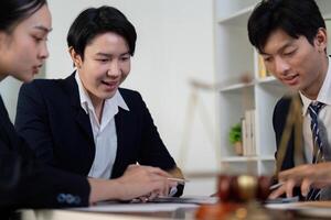 Strategic Legal Consultation and Client Interaction. Lawyers providing tailored guidance in a collaborative meeting. photo
