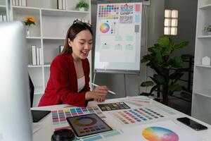 Design Planning and Collaboration. A creative professional analyzing color options. photo