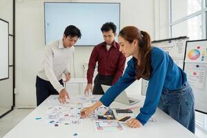 Prototyping and User-Centric Approach. Professionals creating mockups for intuitive user interfaces in a collaborative workspace. photo
