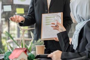 Innovation and Eco-friendly Strategies. A collaborative environment focusing on sustainable development and green technologies. photo