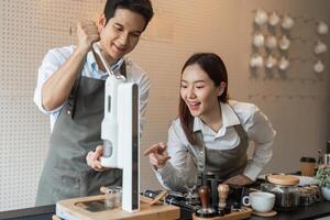 Entrepreneurship and Team Collaboration. Two entrepreneurs working together, excitedly experimenting with a coffee machine in a modern cafe setting. photo
