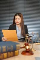 Legal Preparation and Document Review. Attorney analyzing case files in a focused manner. photo