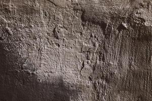 Tonal abstract with a heavily textured wall and a distressed surface that makes for a great backdrop. photo