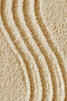 Smooth simple Lines on sand background, minimal aesthetic sandy texture. Spa, meditation, relaxation, wellness concept. Natural beige waves pattern in Japanese zen garden. View from above copyspace photo
