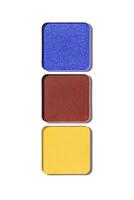 Close up top view of three square eyeshadow refills in bold colors blue, red, and yellow isolated on white background. Eyeshadows color swatches makeup palette for cosmetic, make up, beauty concept photo