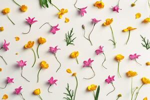 Yellow and purple flowers, green leaves on beige background, minimal pattern, aesthetic floral flat lay photo. Beautiful nature still life with wildflowers bellflower and Ranunculus photo