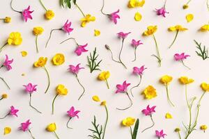 Minimal floral pattern of field flowes, top view Yellow purple flower, green leaf on beige background, spring summer season concept, creative flat lay beauty nature, wild blooms, florals design photo