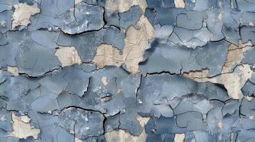 A blue and white painted wall with peeling paint photo