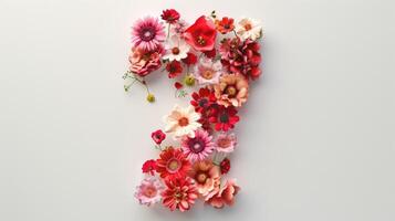 Number seven made of flowers on white background photo