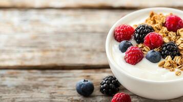 Delicious Yogurt Parfait with Berries Granola and Raspberries on Rustic Wood photo