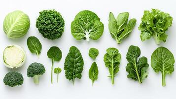 Fresh Green Leafy Vegetables Cabbage and Broccoli Assortment on White Background photo
