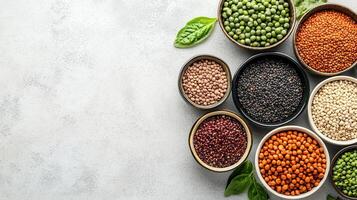 Assorted Legumes and Pulses in Bowls Healthy Food Vegetarian Diet Top View photo