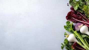 Fresh Organic Vegetables Red Chard Turnips and Red Onion on Light Gray Background photo