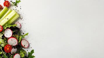 Fresh Salad Ingredients Celery Radishes Tomatoes and Arugula on White Background photo
