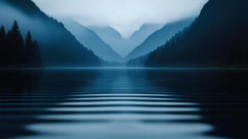 Serene Mountain Lake Landscape at Dawn Misty Morning View Tranquil Water Reflecting Majestic Peaks photo