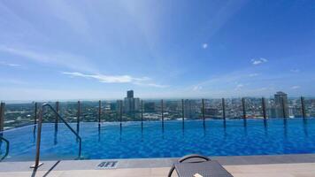 Point of view from a rooftop pool with a breathtaking view of Manilas skyline. video