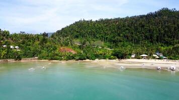 Sweeping drone views of hidden coves, palm-fringed beaches, and lush rainforests in Asia video