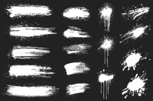 White ink splatters set elements in flat graphic design. Collection of brush strokes and ink spots with messy grainy texture, grimy paintbrush stains and blobs with rough edges. illustration. vector