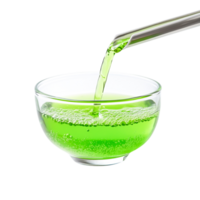Bright Green Liquid Pouring Into Clear Bowl with Bubbles and Reflections png