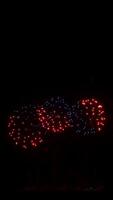 Captivating abstract fireworks display lighting up the night sky during celebration events and holidays video