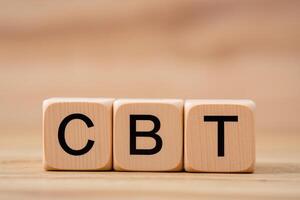 Abbreviation CBT on wooden cubes photo
