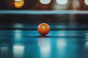 Orange ping pong ball lies on a blue table with a net. Table tennis blur background. Generated by artificial intelligence photo