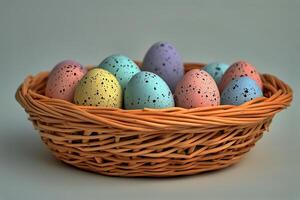 Colorful Speckled Eggs Arranged in a Rustic Wicker Basket During Spring Celebration photo