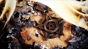 A Magical Occult Symbol Pentagram in Fire and Ashes photo