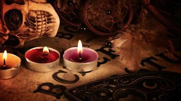 Creepy Skull on a Witchcraft Ouija Board and Candles 14 photo