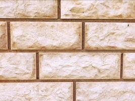 A close up of a brick wall with white paint video
