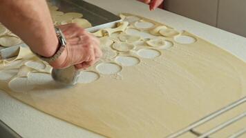 Making dumplings from scratch in a cozy kitchen with flour and dough video