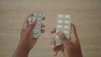 Handling multiple pill packets with care for medication safety video