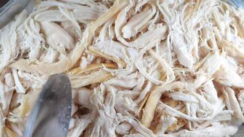closeup of boiled chicken in container video