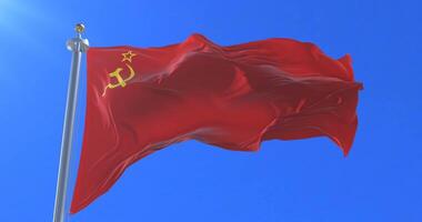 Flag of the Soviet Union waving at wind with blue sky, loop video