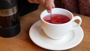 Brewing tea in a cozy cafe during a quiet afternoon video