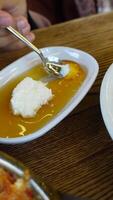 closeup of honey and cream in a container video