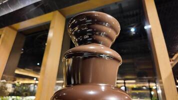 Indulgence at a chocolate fountain in a gourmet location video