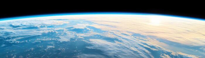 A breathtaking view of Earth from space, showcasing clouds and ocean curves. photo