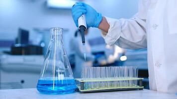 Medical Research Laboratory. Scientist Using Micro Pipette for Test Analysis. Advanced Scientific Lab for Medicine, Biotechnology, Microbiology Development. Advertising, blue background, banner photo