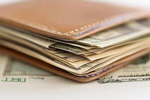 A wallet with money sitting on top of it photo