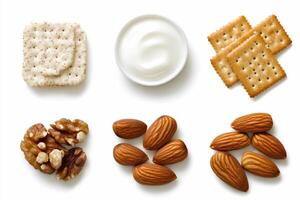 Various types of nuts and crackers on a white background photo