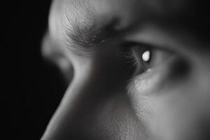 Close up of a man's eyes looking at something photo