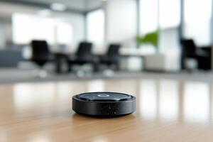 A small black device sitting on a table in an office photo