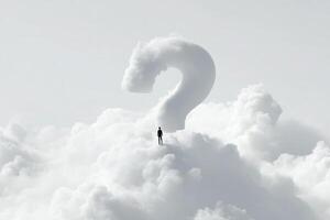 Man standing in the clouds with question mark photo