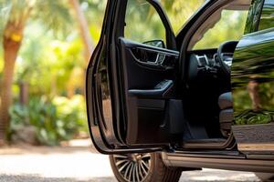 The door open of a black suv photo