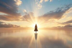 A person standing in the middle of a lake with the sun shining photo