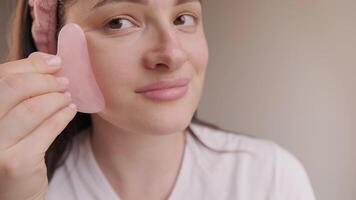 Gua sha massage is an effective way to reduce morning puffiness and enhance skin tone for a refreshed and glowing complexion. video