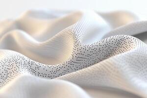 A close up of a white fabric with dots photo
