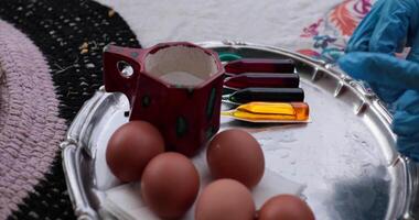 Observe the exciting process of egg coloring as various tools and colorful paints are used to create beautiful Easter eggs. video